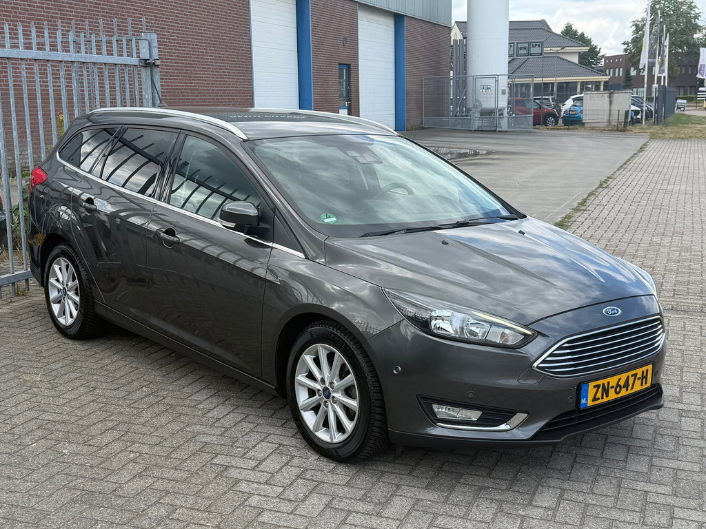 Ford FOCUS Wagon 1.0 Titanium D-riem nieuw! Navi l Cruise l Stoel&stuurverwarming l Keyless l Parkeerhulp l Trekhaak l TOPSTAAT! 55722228-0.jpg | Autobedrijf van Susteren & Zn